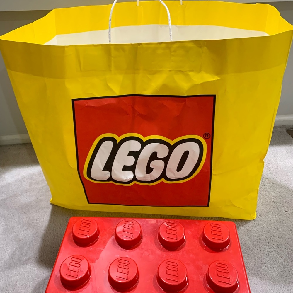 Large Lego shopping bag and empty lego storage container